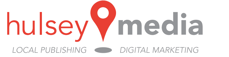 Vibrant Asheville Area Business Association logo with red and gray text and location pin icon.